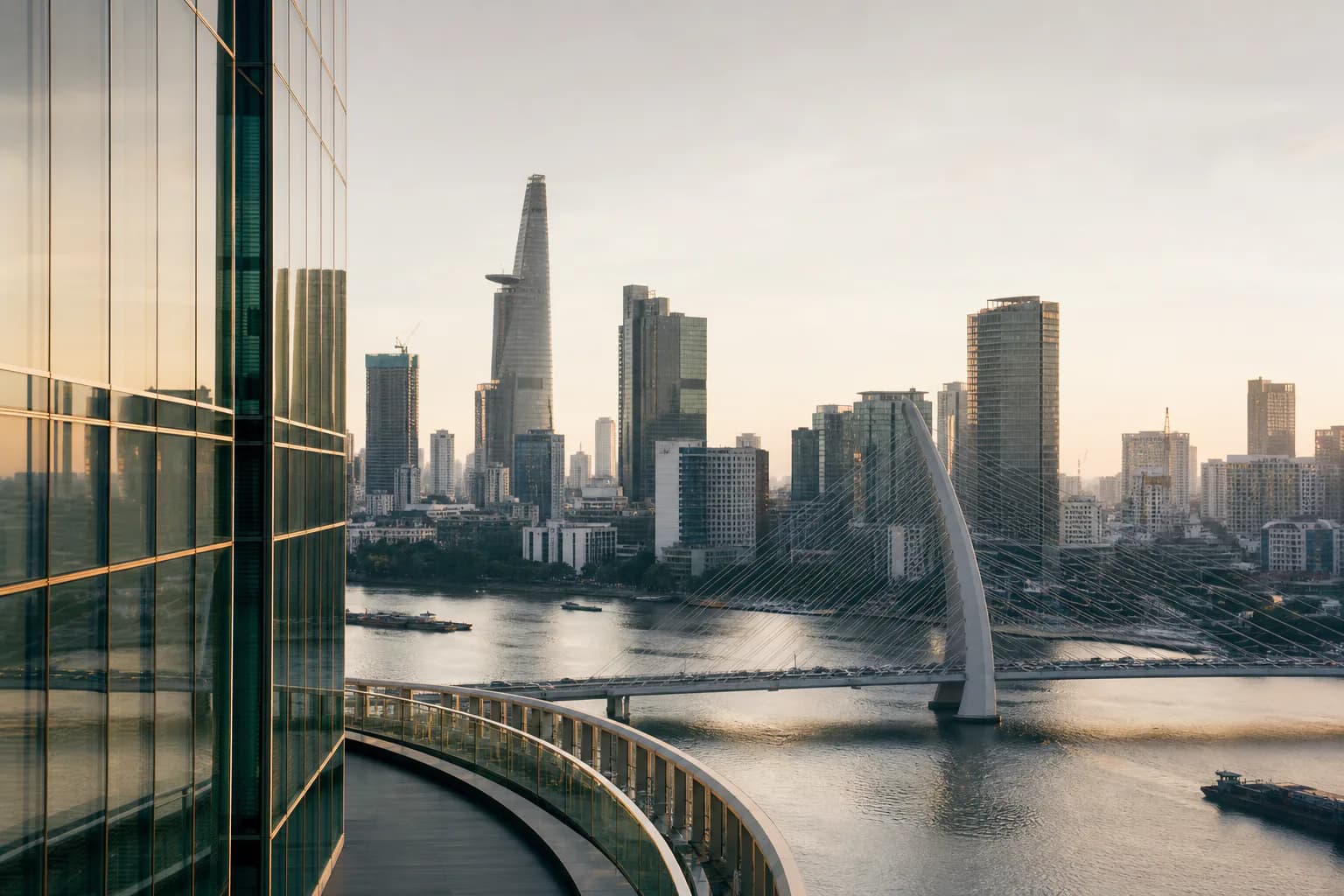 Contemporary Ho Chi Minh City skyline and river infrastructure in warm afternoon light
